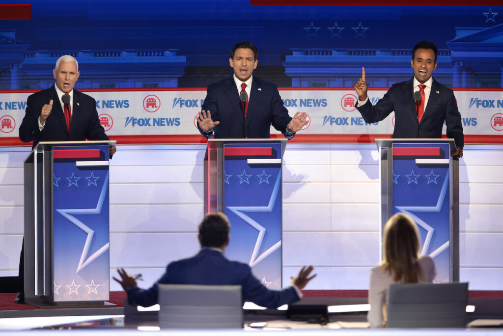 GOP Candidates Mike Pence, Ron DeSantis, and Vivek Ramaswamy face off at the Republican National Committee Debate in Milwaukee, WI.